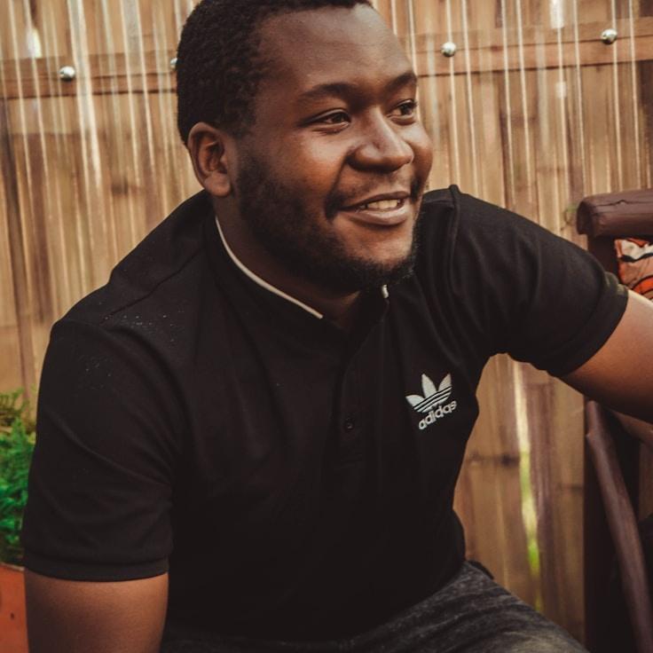 Kaveri Mehta, Lead Design Curator at Plate Silent Vivid, reviewing corporate floral arrangements